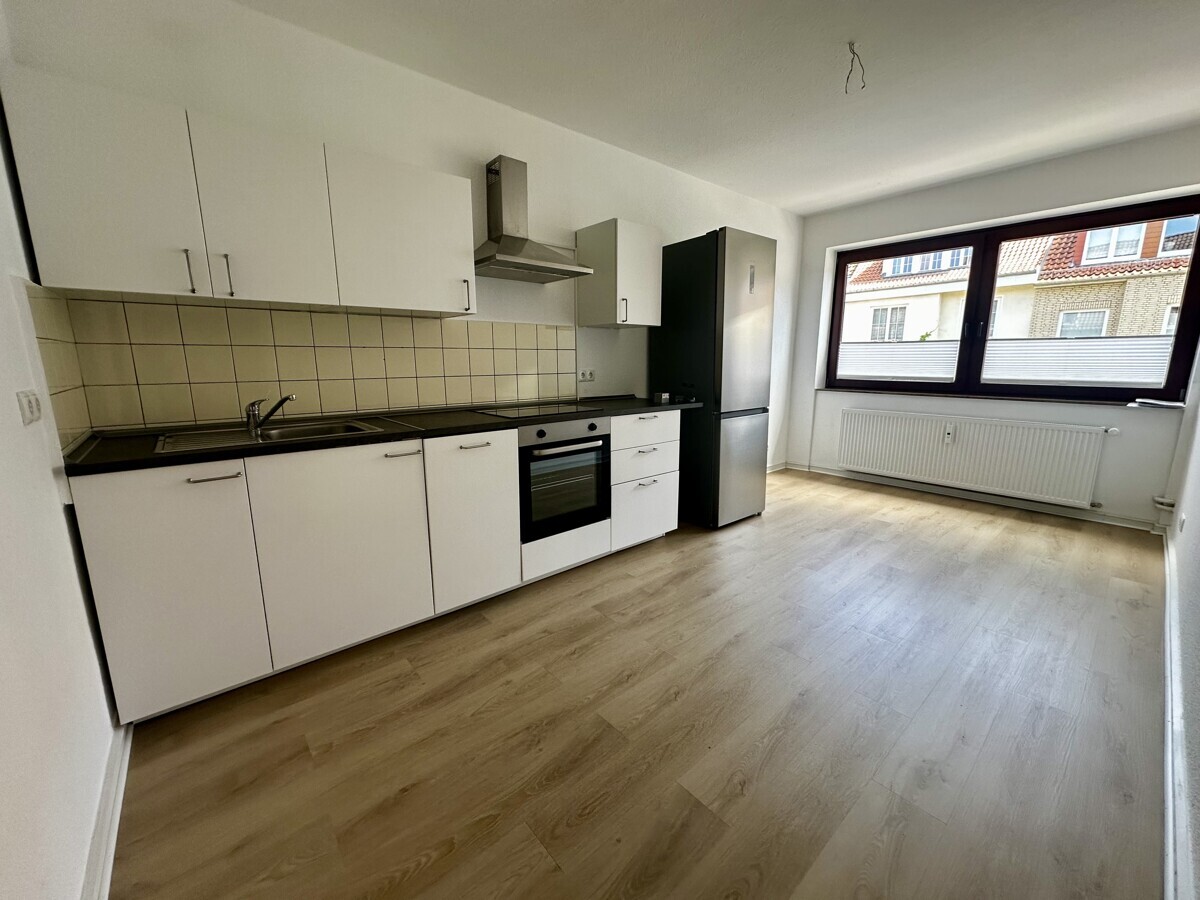 Wachmannquartier: ruhige 2 Zimmer Wohnung im 1. OG, gr. Balkon m. Blick ins Grüne und Einbauküche - Foto 2